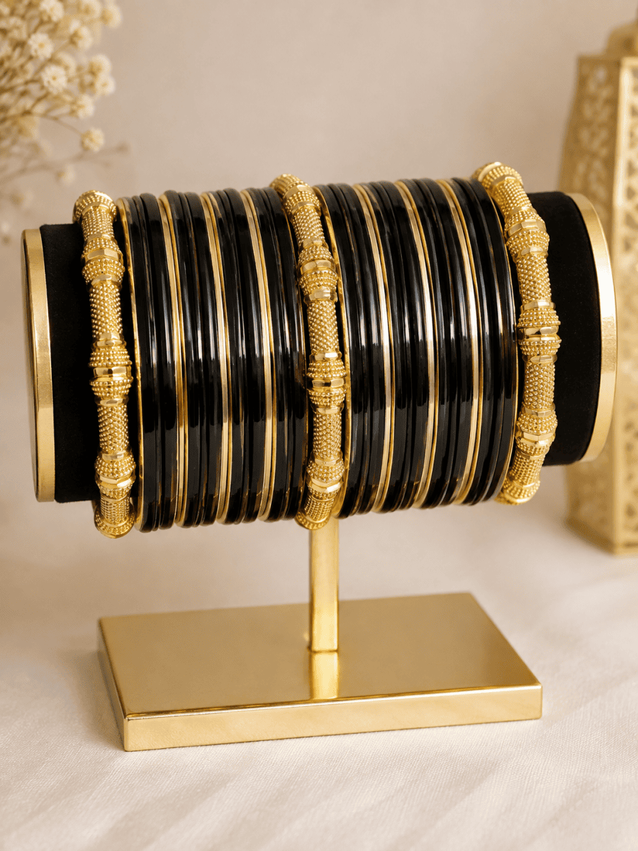 (B24) A stunning combination of glossy black bangles with delicate gold detailing and beautifully textured statement pieces. Elegant, timeless and perfect traditional outfits size 2.6