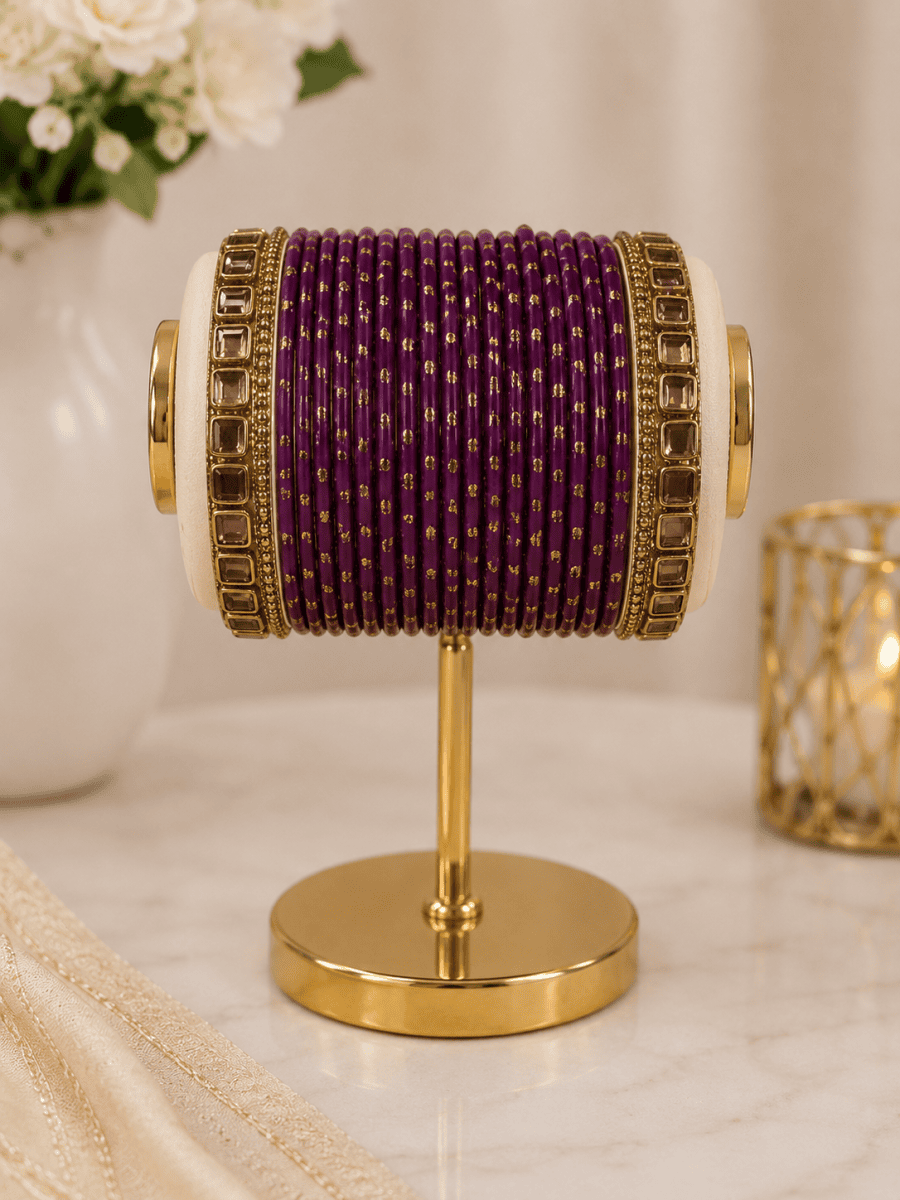 (B15) Elegant deep purple bangle set featuring delicate gold detailing and statement gold-toned stone bangles on each side. A beautiful traditional accessory size 2.4