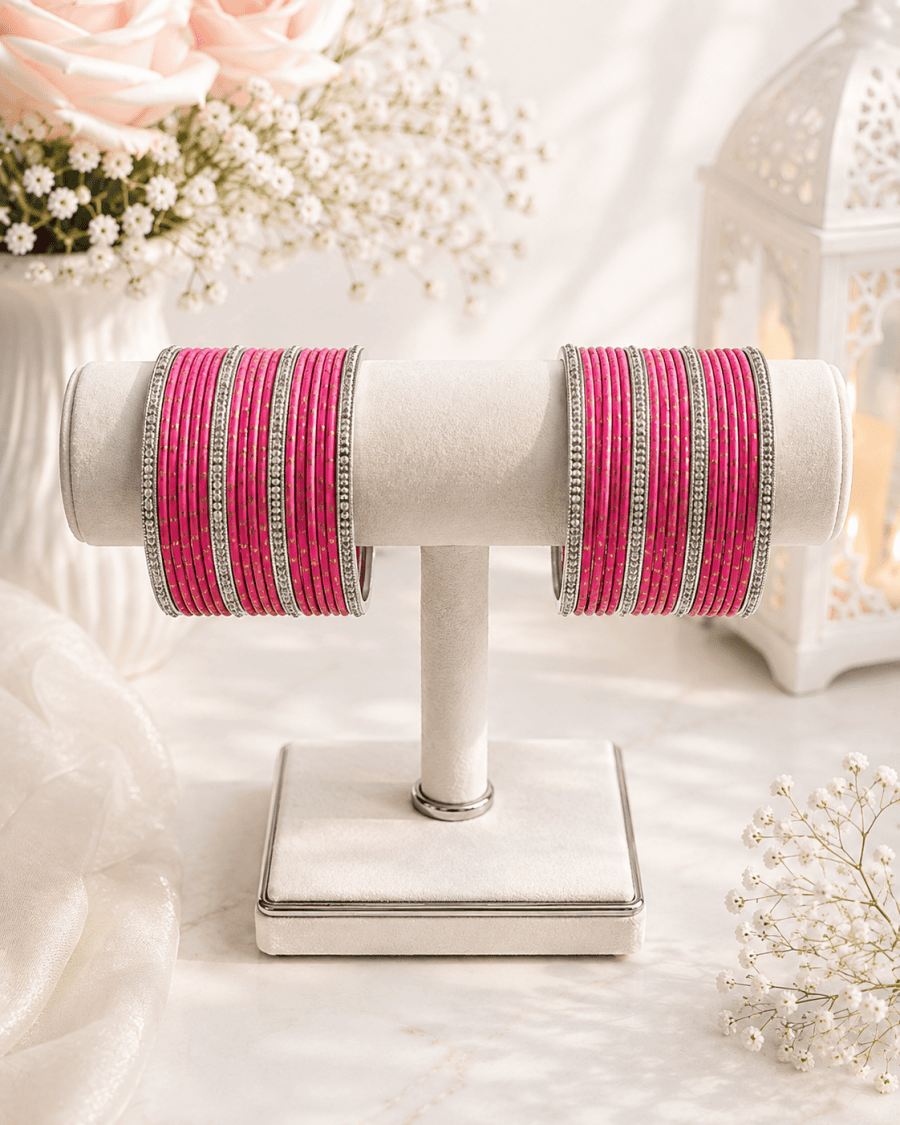(B2) Elegant hot pink bangle set with sparkling silver detailing and delicate gold accents size 2.6
